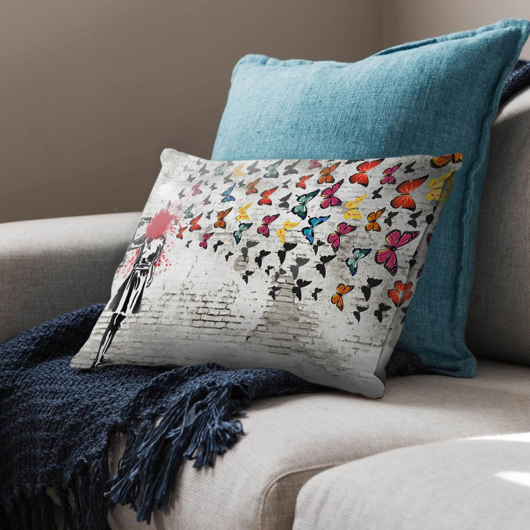 Banksy Girl Shooting Butterflies Cushion. - Image 2